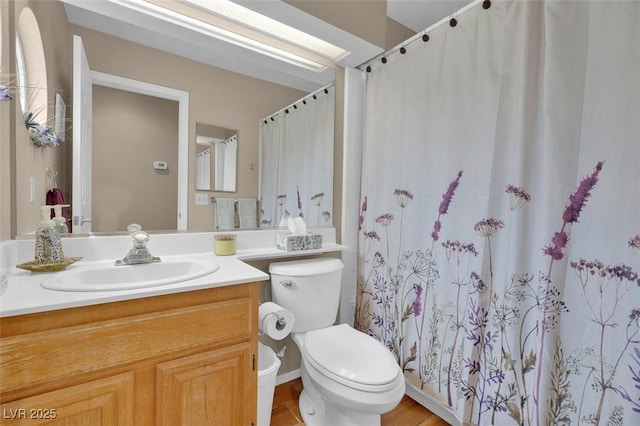 4628 Standing Bluff Way, Las Vegas, NV 89130 - bathroom featuring vanity, toilet, and curtained shower