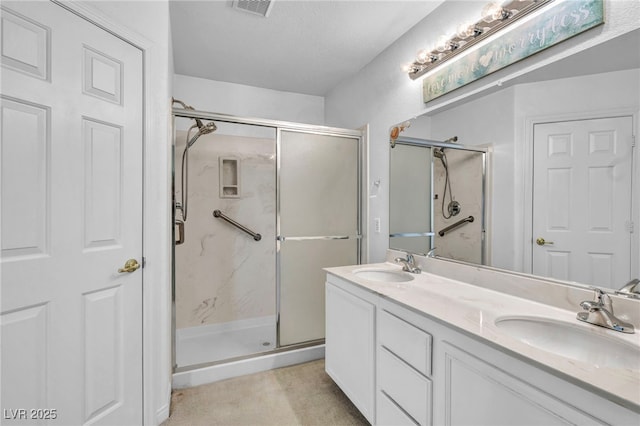 7886 Palace Monaco Ave, Las Vegas, NV 89117 - bathroom featuring a shower stall and double vanity