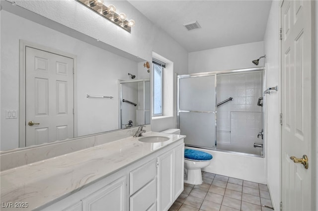 7886 Palace Monaco Ave, Las Vegas, NV 89117 - full bathroom with toilet, vanity, combined bath / shower with glass door, and tile patterned floors