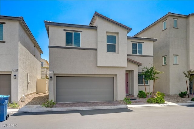 6940 Crescent Gold St, North Las Vegas, NV 89086 - view of front of house featuring stucco siding and an attached garage