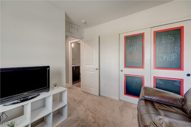 6940 Crescent Gold St, North Las Vegas, NV 89086 - living area featuring carpet and baseboards