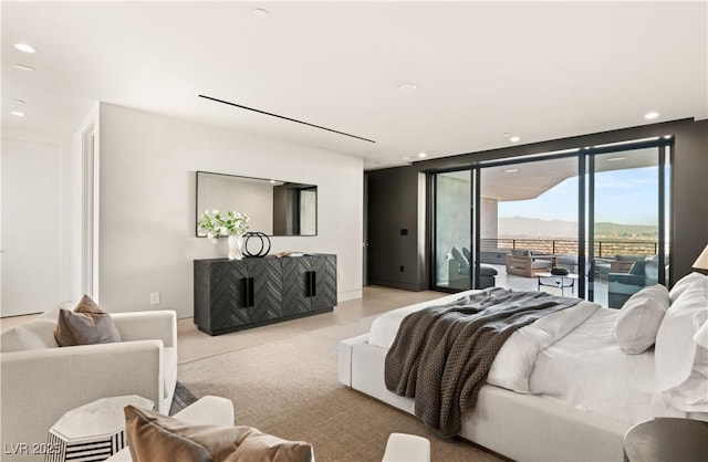 4 Horseshoe Rock Ct, Henderson, NV 89012 - bedroom with access to exterior, expansive windows, and recessed lighting