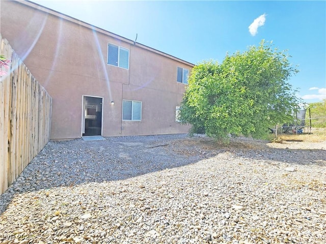 1951 Teepee Rd, Pahrump, NV 89048 - rear view of house with stucco siding