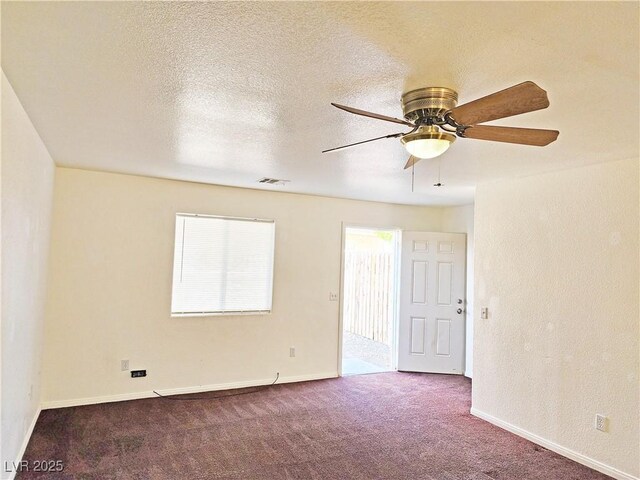 1951 Teepee Rd, Pahrump, NV 89048 - carpeted empty room featuring ceiling fan, baseboards, and a textured ceiling
