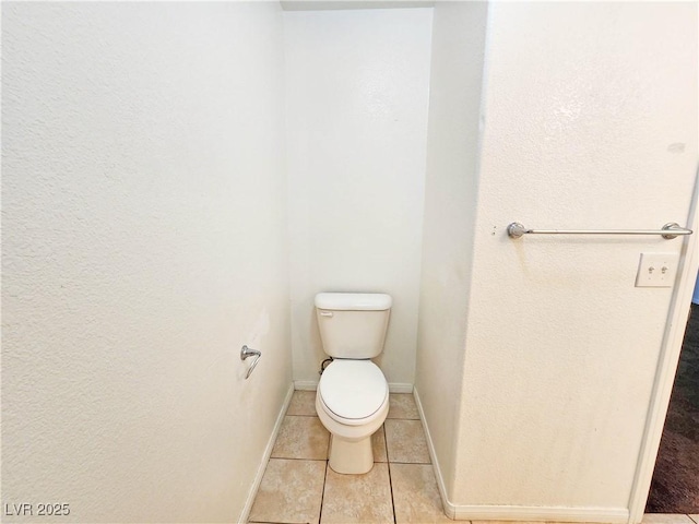 1951 Teepee Rd, Pahrump, NV 89048 - bathroom with toilet, tile patterned flooring, and baseboards