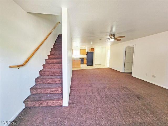 1951 Teepee Rd, Pahrump, NV 89048 - staircase with a ceiling fan, carpet, and baseboards