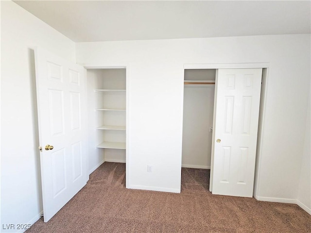 1951 Teepee Rd, Pahrump, NV 89048 - unfurnished bedroom featuring carpet flooring, baseboards, and a closet