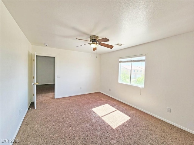 1951 Teepee Rd, Pahrump, NV 89048 - carpeted spare room featuring ceiling fan and baseboards