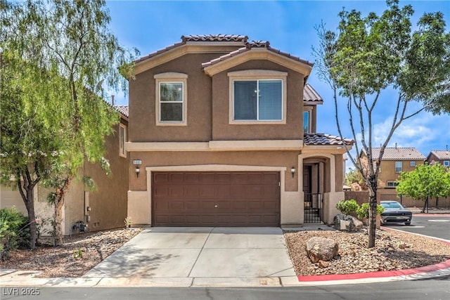 9005 Semillon St, Las Vegas, NV 89148 - view of front of property with a tile roof, stucco siding, a garage, and driveway