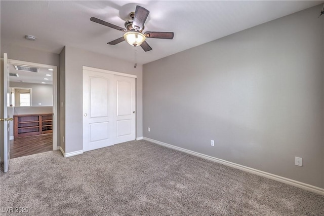 9005 Semillon St, Las Vegas, NV 89148 - unfurnished bedroom featuring carpet floors, a closet, baseboards, and a ceiling fan