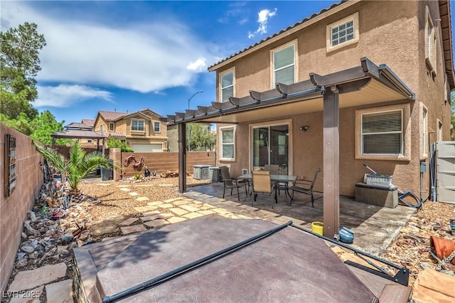 9005 Semillon St, Las Vegas, NV 89148 - back of property with stucco siding, a patio area, a fenced backyard, and central AC unit