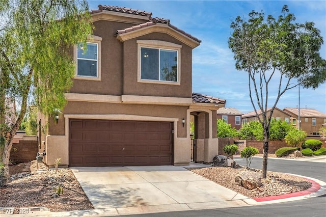 9005 Semillon St, Las Vegas, NV 89148 - mediterranean / spanish-style house featuring stucco siding, a tile roof, an attached garage, and concrete driveway