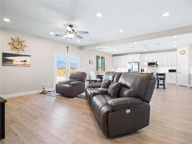 1500 E Laguna St, Pahrump, NV 89048 - living area featuring ceiling fan, recessed lighting, light wood-style flooring, and baseboards