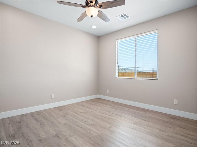 1500 E Laguna St, Pahrump, NV 89048 - unfurnished room with light wood-type flooring, ceiling fan, baseboards, and recessed lighting