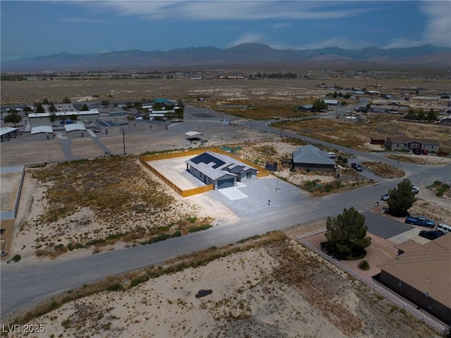 1500 E Laguna St, Pahrump, NV 89048 - aerial view of residential area with a mountain backdrop and a desert landscape