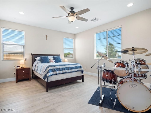 1500 E Laguna St, Pahrump, NV 89048 - bedroom featuring baseboards, light wood-style floors, recessed lighting, and a ceiling fan