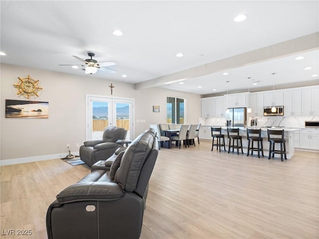 1500 E Laguna St, Pahrump, NV 89048 - living room with recessed lighting, baseboards, light wood-style floors, and ceiling fan