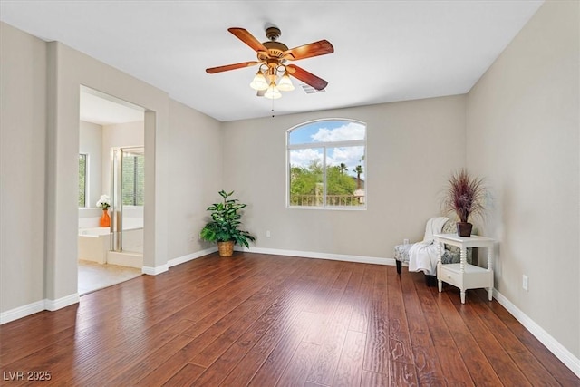 11022 Saint Rafael St, Las Vegas, NV 89141 - unfurnished room featuring hardwood / wood-style floors, ceiling fan, and baseboards