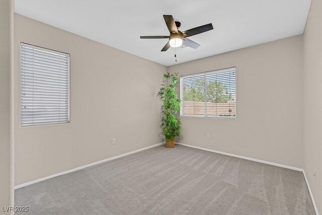 11022 Saint Rafael St, Las Vegas, NV 89141 - carpeted spare room featuring baseboards and ceiling fan