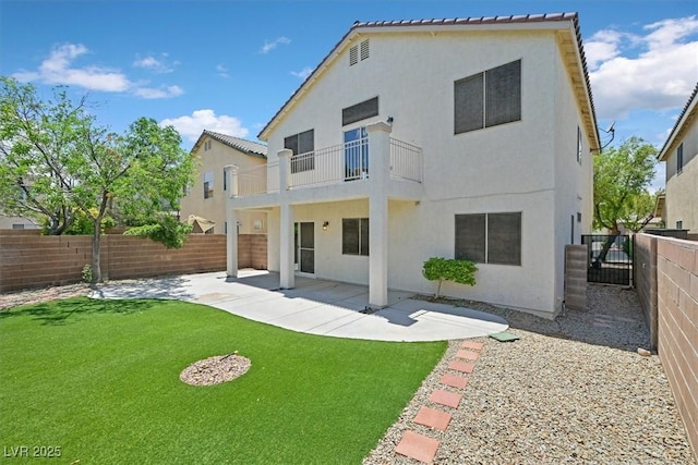 11022 Saint Rafael St, Las Vegas, NV 89141 - back of property featuring a balcony, stucco siding, and a patio