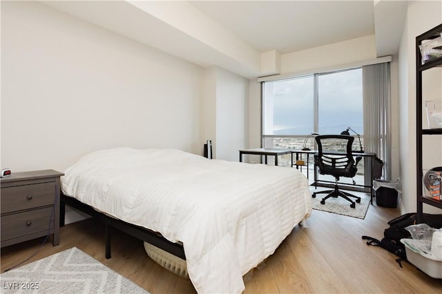 200 W Sahara Ave Unit 910, Las Vegas, NV 89102 - bedroom with wood finished floors
