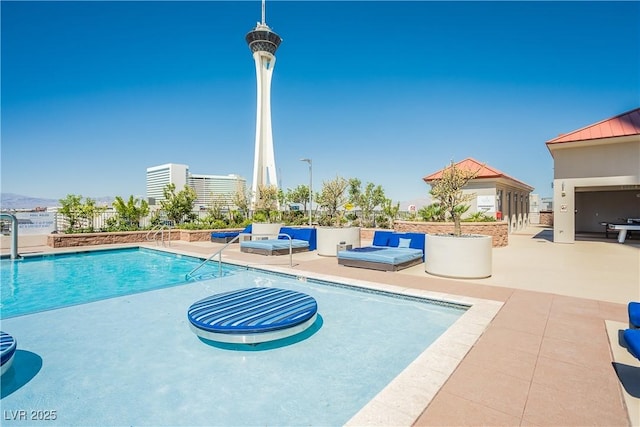 200 W Sahara Ave Unit 910, Las Vegas, NV 89102 - community pool with a patio area
