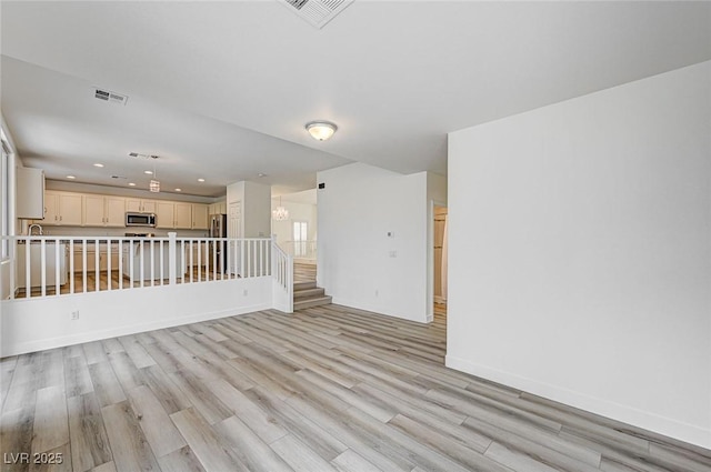 301 Lakewood Garden Dr, Las Vegas, NV 89148 - unfurnished room featuring light wood-type flooring, recessed lighting, and baseboards