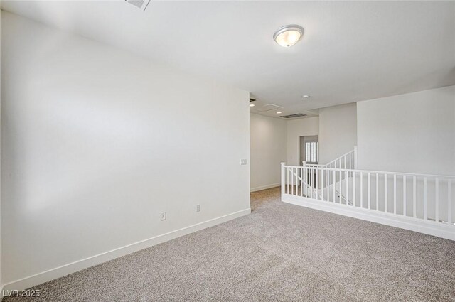 301 Lakewood Garden Dr, Las Vegas, NV 89148 - carpeted spare room with baseboards and attic access