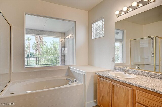 301 Lakewood Garden Dr, Las Vegas, NV 89148 - bathroom with a bath, vanity, and a shower stall