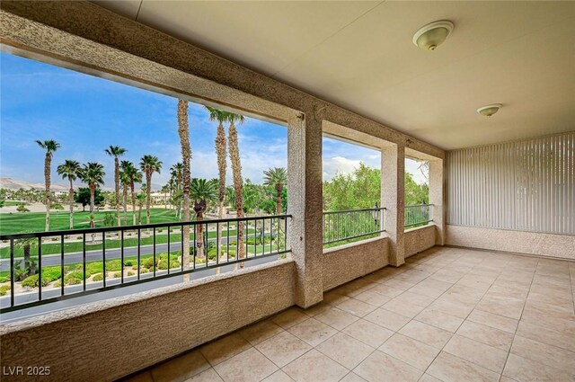 301 Lakewood Garden Dr, Las Vegas, NV 89148 - unfurnished sunroom featuring tile patterned flooring