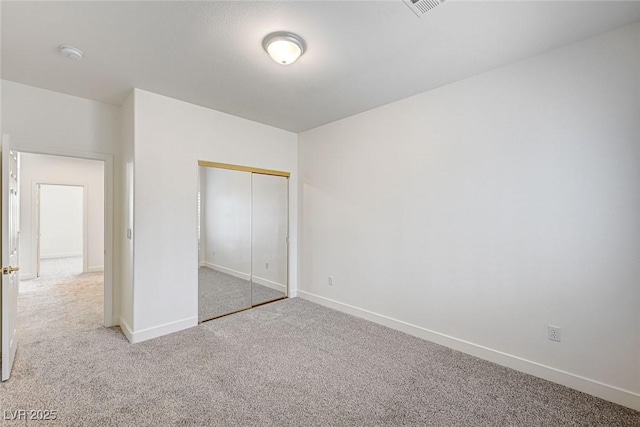 301 Lakewood Garden Dr, Las Vegas, NV 89148 - unfurnished bedroom with carpet floors, a closet, and baseboards