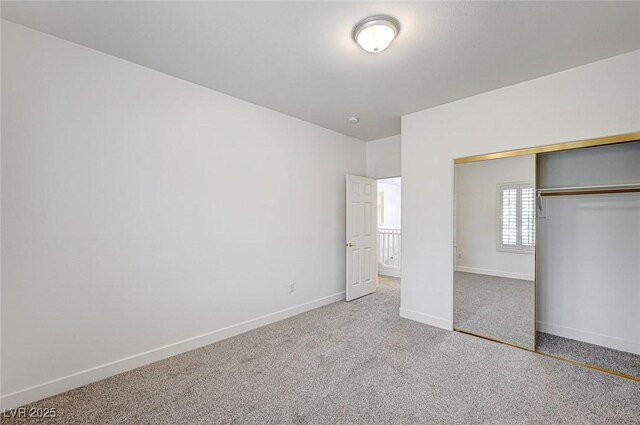 301 Lakewood Garden Dr, Las Vegas, NV 89148 - unfurnished bedroom with a closet, baseboards, and carpet flooring