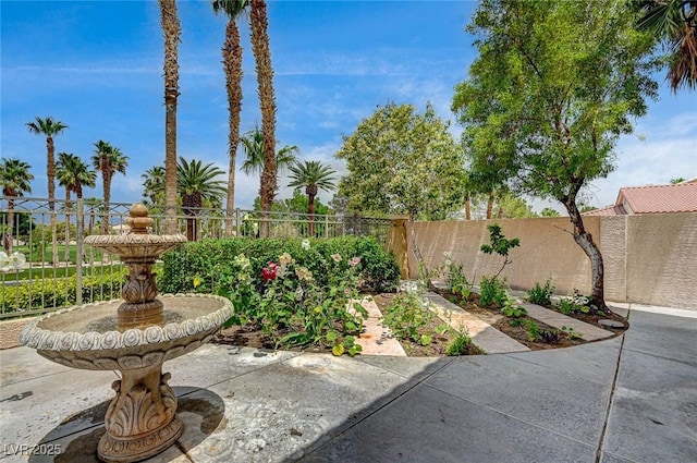 301 Lakewood Garden Dr, Las Vegas, NV 89148 - fenced backyard with a patio area