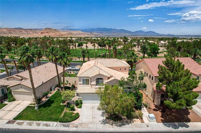 301 Lakewood Garden Dr, Las Vegas, NV 89148 - aerial view of residential area featuring a mountain backdrop