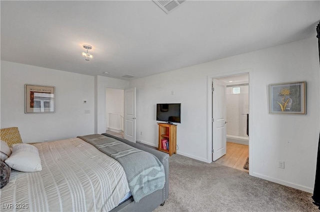 7756 Seville Estates Ct, Las Vegas, NV 89113 - bedroom featuring light carpet, baseboards, and connected bathroom