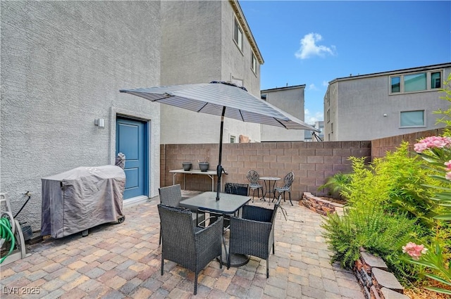 7756 Seville Estates Ct, Las Vegas, NV 89113 - view of patio featuring outdoor dining area and area for grilling