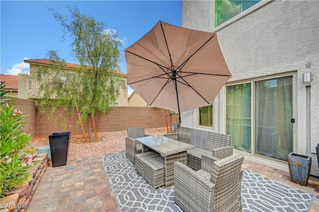 7756 Seville Estates Ct, Las Vegas, NV 89113 - fenced backyard featuring outdoor dining area and a patio