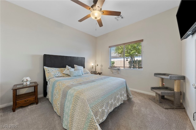 5375 E Ln Campana Dr, Pahrump, NV 89061 - bedroom with light colored carpet and a ceiling fan