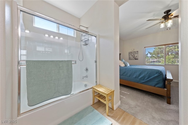 5375 E Ln Campana Dr, Pahrump, NV 89061 - ensuite bathroom featuring plenty of natural light, enclosed tub / shower combo, wood finished floors, and ceiling fan