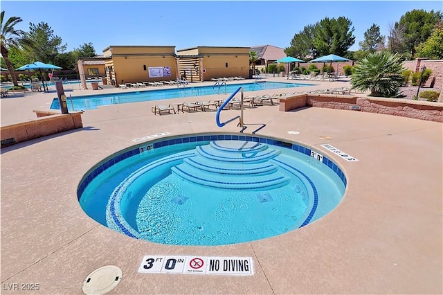 5375 E Ln Campana Dr, Pahrump, NV 89061 - community pool featuring a patio area