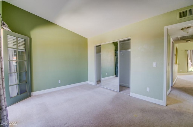 2212 Sunfish Dr Unit C, Henderson, NV 89014 - unfurnished bedroom with carpet flooring, baseboards, vaulted ceiling, and a closet
