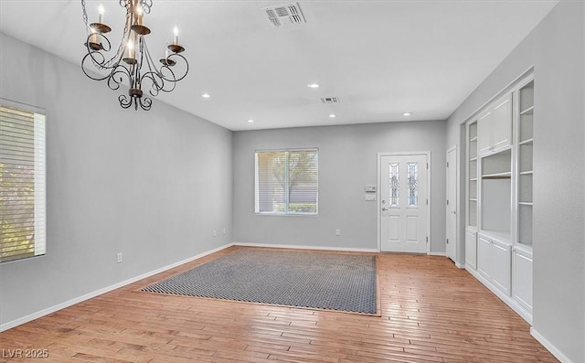 1941 Williamsport St, Henderson, NV 89052 - foyer entrance with a chandelier, hardwood / wood-style floors, baseboards, and recessed lighting