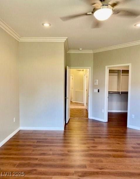 1941 Williamsport St, Henderson, NV 89052 - spare room with a ceiling fan, crown molding, wood finished floors, baseboards, and recessed lighting