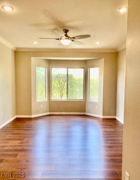 1941 Williamsport St, Henderson, NV 89052 - unfurnished room featuring crown molding, dark wood-style flooring, baseboards, a ceiling fan, and recessed lighting