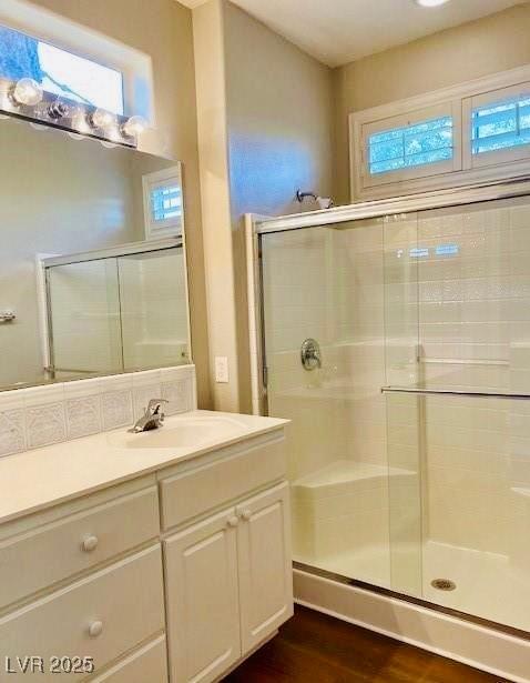 1941 Williamsport St, Henderson, NV 89052 - full bath with vanity, a stall shower, and wood finished floors