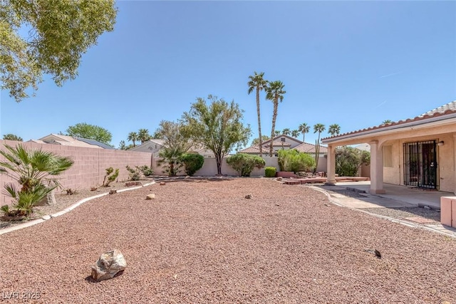 5808 Spinnaker Reach Ave, Las Vegas, NV 89130 - fenced backyard featuring a patio