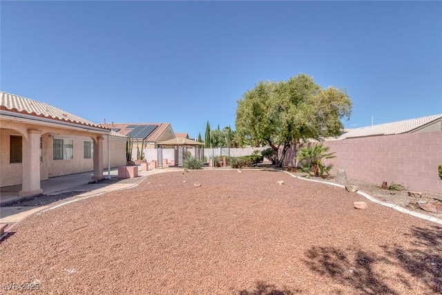 5808 Spinnaker Reach Ave, Las Vegas, NV 89130 - fenced backyard with a gazebo and a patio