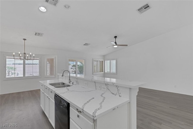 5808 Spinnaker Reach Ave, Las Vegas, NV 89130 - kitchen with dishwasher, a sink, wood finished floors, ceiling fan, and white cabinetry