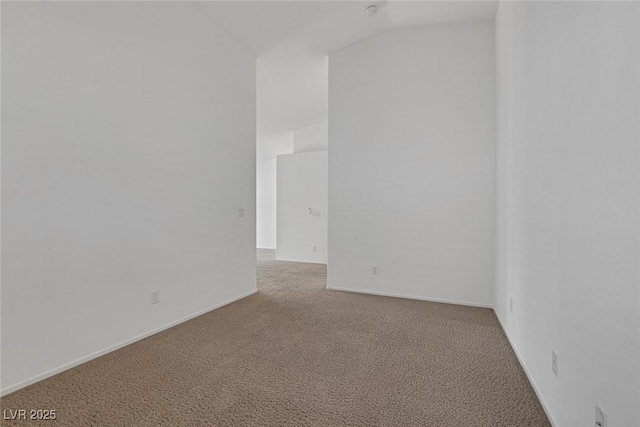 5808 Spinnaker Reach Ave, Las Vegas, NV 89130 - unfurnished room featuring carpet floors, lofted ceiling, and baseboards