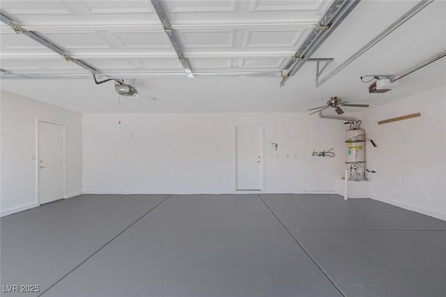 5808 Spinnaker Reach Ave, Las Vegas, NV 89130 - garage with water heater and a garage door opener